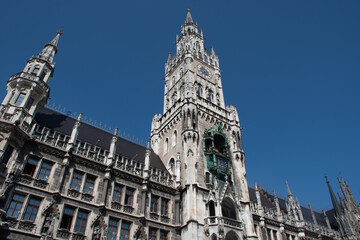 Fototapeta na wymiar Tower of Neues Rathaus (New Town Hall) in Marienplatz square in the historic city center of Munich, Germany