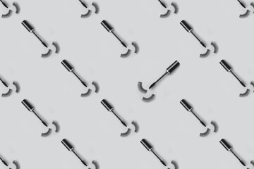 Set for eye lash extension on trendy gray background. Fake eyelashes, mascara brush, Beauty stylish seamless pattern concept, makeup cosmetics. Banner for site, header