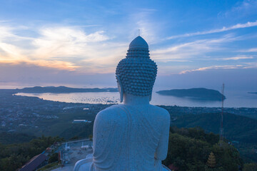aerial view head of Phuket big Buddha in blue sunrise..Phuket Big Buddha is one of the island most important and revered landmarks on the island..image for travel and culture concept. © Narong Niemhom