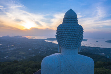 aerial view head of Phuket big Buddha in blue sunrise..Phuket Big Buddha is one of the island most important and revered landmarks on the island..image for travel and culture concept. © Narong Niemhom