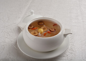 Chinese chilled hashima and herbal red dates sweet soup in white bowl asian healthy Halal dessert menu