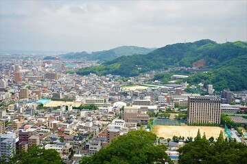 Aerial view of Matsuyama city from Matsuyama castle in Ehime, Japan - 日本 愛媛県 松山市 街並み	