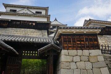 Fototapeta na wymiar Shichiku Gate at Matsuyama Castle in Ehime, Japan - 日本 愛媛県 松山市 松山城 天守閣 紫竹門