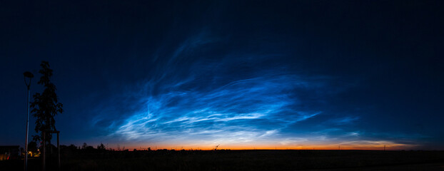 Noctilucent clouds in late summer evening