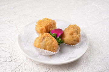 deep fried crispy mini pastry ball with red bean, banana, yam, durian inside asian Hong Kong dim...