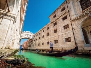 Venice tight water streets with popular gondola transportation