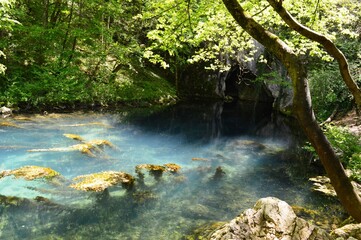 a clean river and a reflection in it