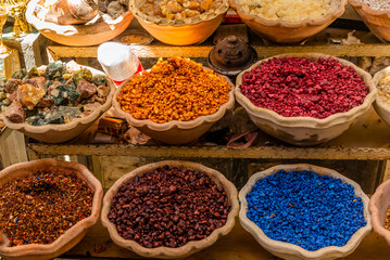Fototapeta premium Colorful bowls of incense on sale in the traditional Jerusalem Shuk (Market) in the Old City