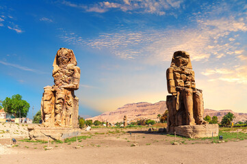 The Colossi of Memnon, famous statues of Luxor, Egypt