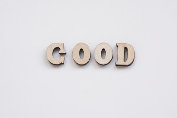Wooden letters on white background