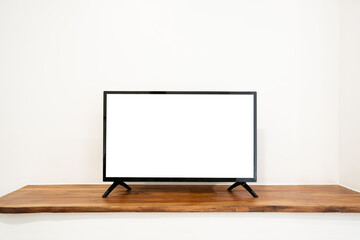 Blank Television screen on cupboard isolated on white background. TV template with copy space.