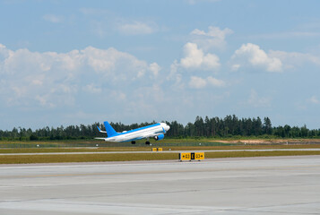 The plane takes off from the runway at the airport
