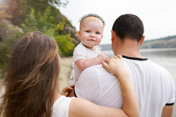 family walking outdoors. The concept of a happy family