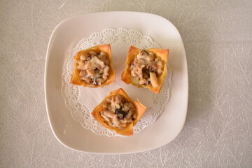 deep fried crispy wanton skin in bird nest shape with assorted mushroom and cheese Hong Kong dim...