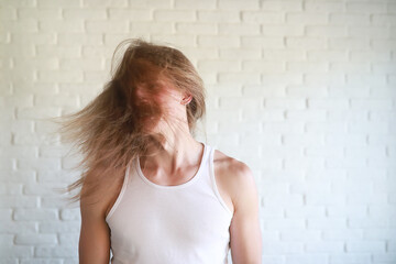 Young man with long hair