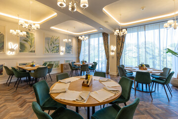 Interior of an empty modern hotel restaurant