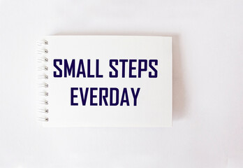 Inspirational quote on white background SMALL STEPS EVERYDAY