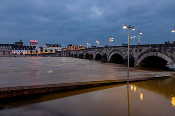 Maastricht, Netherlands 07-16-2021 long night exposure of the floods in downtown Maastricht and the historical centre next to the Meuse after heavy rain with over 150mm of rain in less than 24 hours