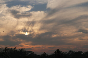 Orange and blue clouds unite in the afternoon