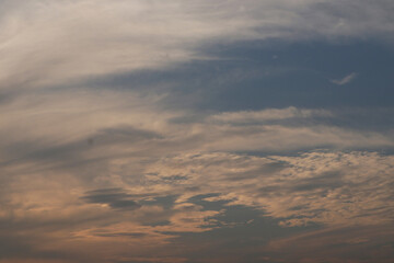 Orange and blue clouds unite in the afternoon