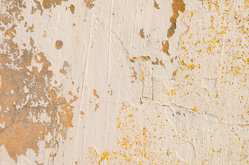 Old painted cracked wall with peeling paint. Grunge background. Expressive texture