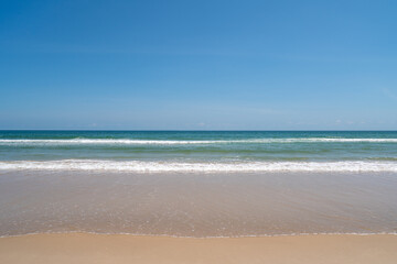 Fototapeta na wymiar Beautiful sea A beach with fine grains of sand and blue skies, no ships