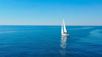 Zelfklevend Fotobehang Aerial view of sailing luxury yacht at opened sea at sunny day in Croatia © dtatiana