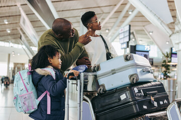 Tourist family waiting at international airport