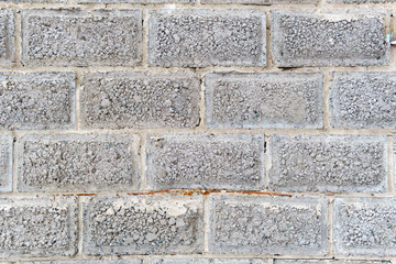 Texture gray stones laying in pieces. Covering the walls with natural stones