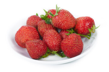 Fresh red strawberries on white plate. Isolated on white