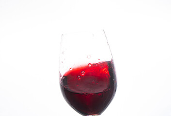 red wine pouring into glass