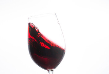 red wine pouring into glass