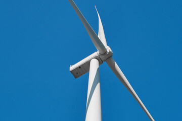View from below of wind turbines. Wind turbine details. 
