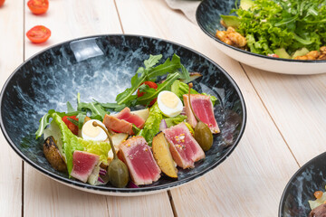 fresh summer light salad with tuna and arugula