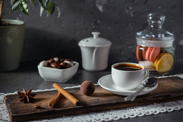 Cup of coffee on wooden board table background. Set of coffee and sweets food ingredient