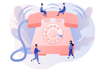 Phone Call. Big retro phone and tiny people. Incoming call concept. Communication device. Modern flat cartoon style. Vector illustration on white background