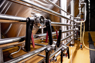 Obraz premium Craft beer brewing equipment in privat brewery
