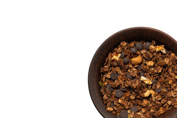 Chocolate granola cereal with nuts in a bowl background.