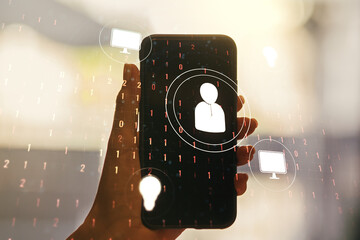 Double exposure of social network icons concept and hand with cell phone on background. Marketing and promotion concept