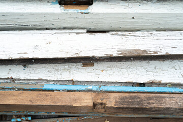 Waste old painted wood pile background and texture