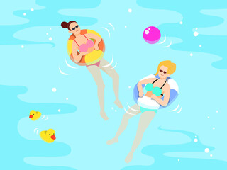 プールに浮かぶ二人の女性