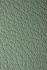 A close-up shot of the surface of leather used for handmade