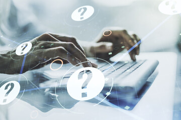 Creative abstract question mark hologram and hands typing on computer keyboard on background,...