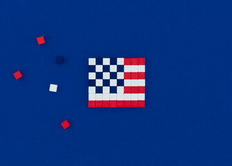 American flag made of magnetic cubes in pixel art style. American independence day concept.