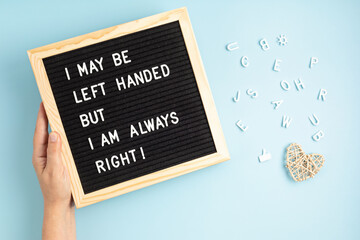 Felt board with text I may be left handed but I am always right. Left handers day concept