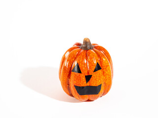 Happy Halloween, pumpkin and leaves on a white background. 