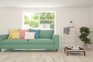 White living room with sofa and summer landscape in window. Scandinavian interior design. 3D illustration