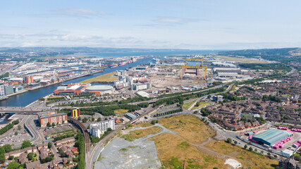 Aerial view on river and buildings in City center of Belfast Northern Ireland. Drone photo, high angle view of town