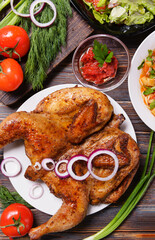 caucasian cuisine, tobacco chicken with tomato, onion