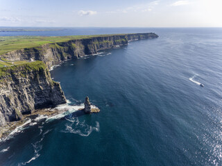 World famous Cliffs of Moher. Popular tourist destination in Ireland. Aerial birds eye view attraction on Wild Atlantic Way in County Clare. - 445875875